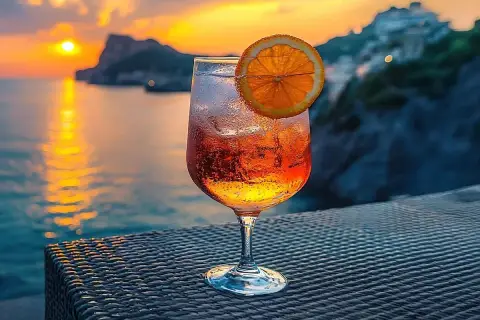Orzeźwiający Crodino, co to jest? Ten aperitif idealnie pasuje do zachodu słońca nad morzem.
